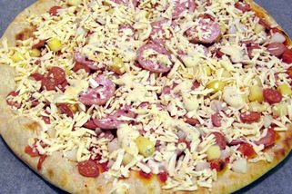 Jen jeden národ sní víc pizzy než Italové. A místní ji mají i na Štědrý den