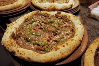 Jak by chutnala pizza v době starověkého Říma? Budapešťská restaurace nabízí odpověď - Novinky