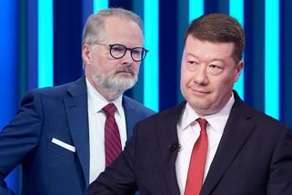 Primitivní nacionalismus, hodnotil Fiala postoj vlády k landsmanšaftu. Okamura mluvil o NSDAP